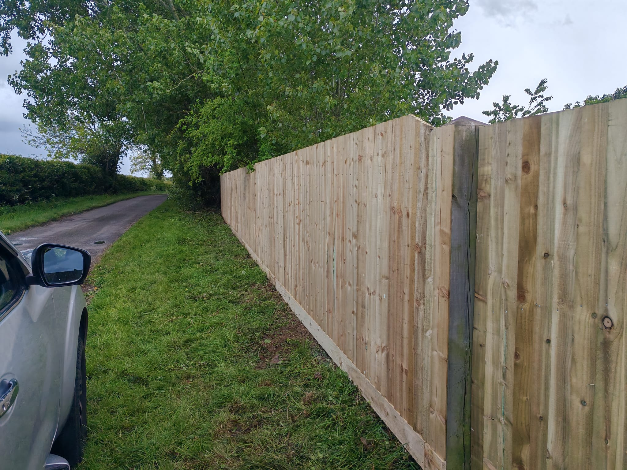 Close view of feather edge timber boundary fencing in Skegness