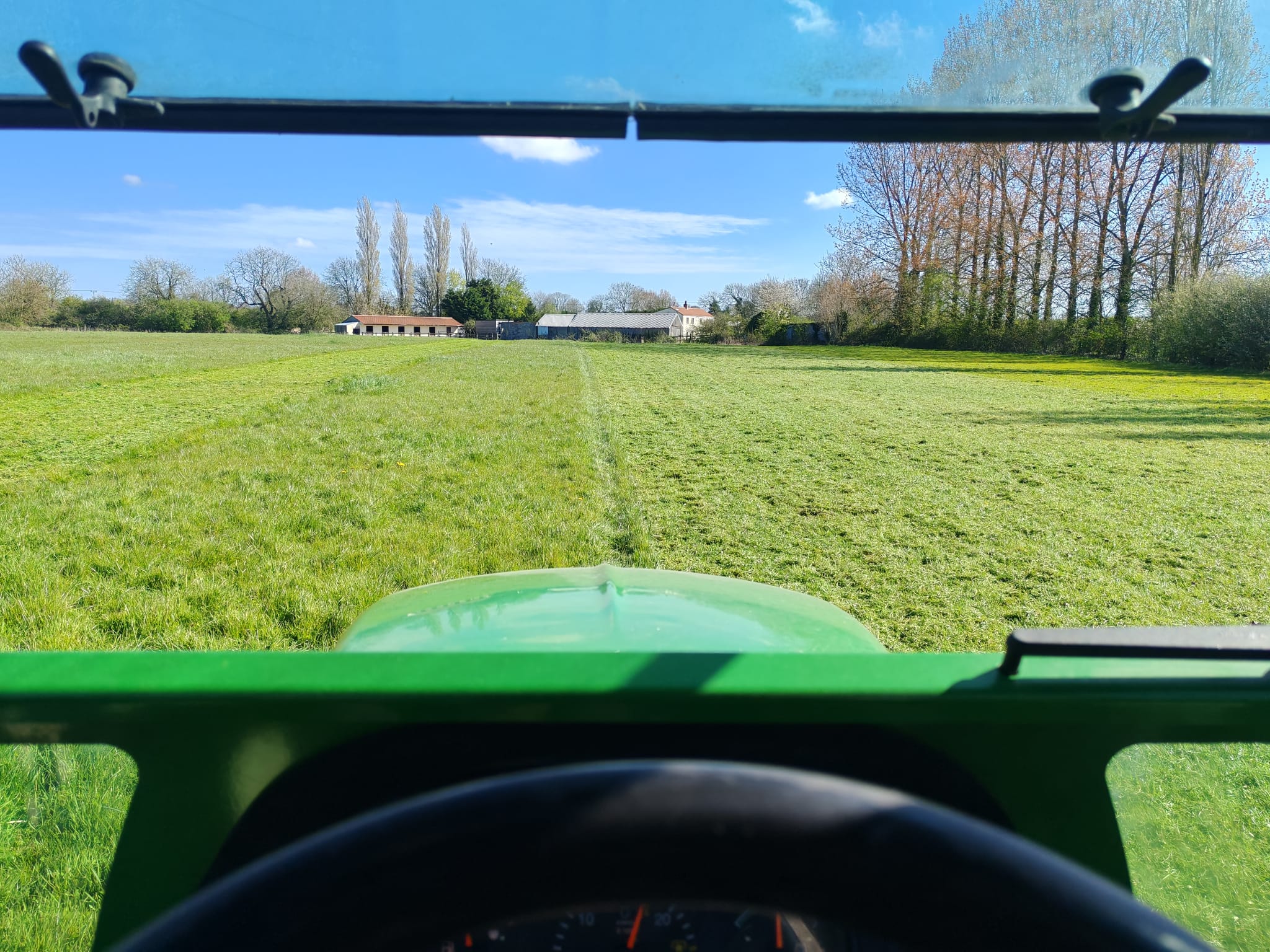 View from an MES Rural tractor while topping a grass field in Lincolnshire