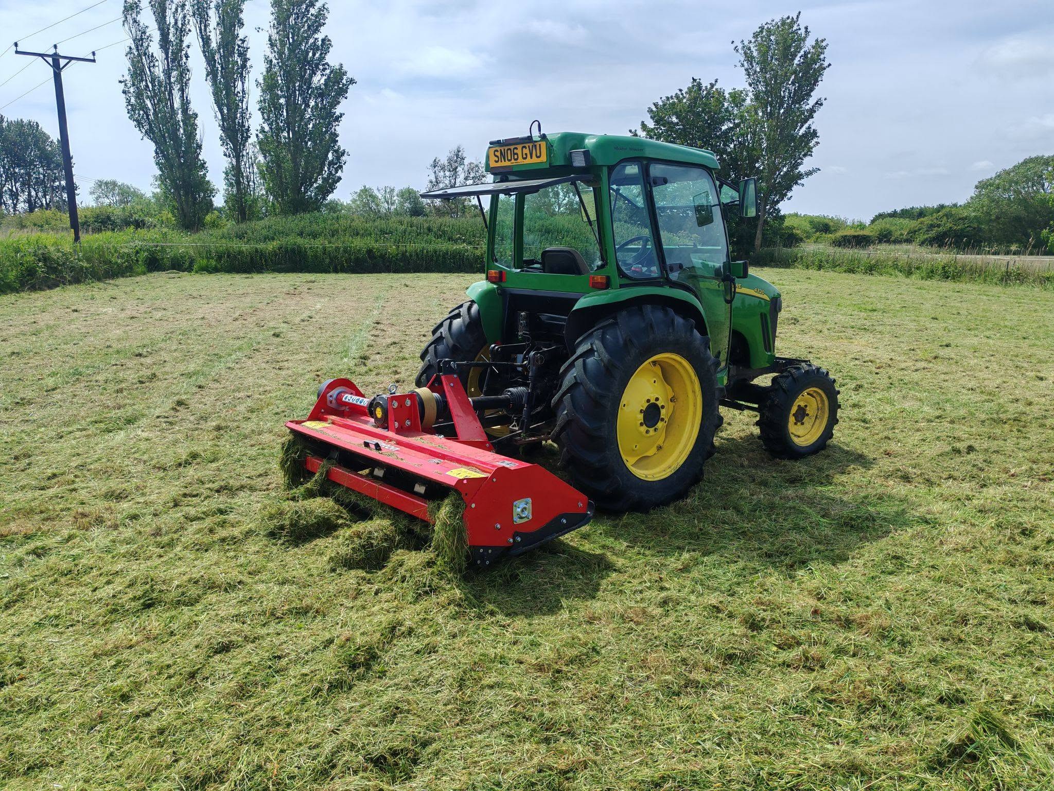 MES Rural tractor and flail mower completing grass groundcare in Lincolnshire